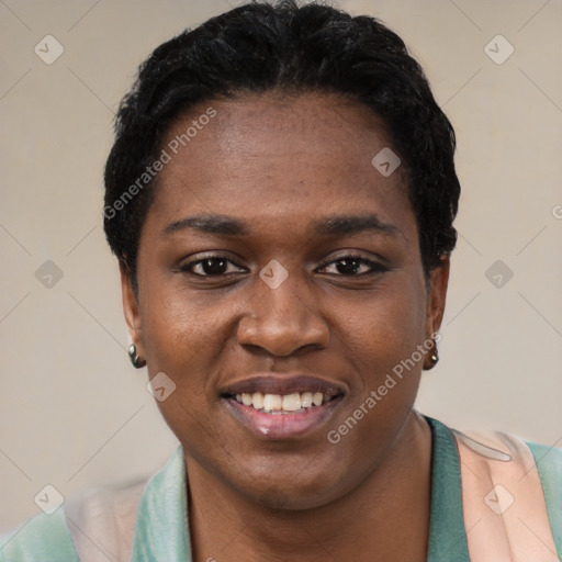 Joyful black young-adult female with short  black hair and brown eyes