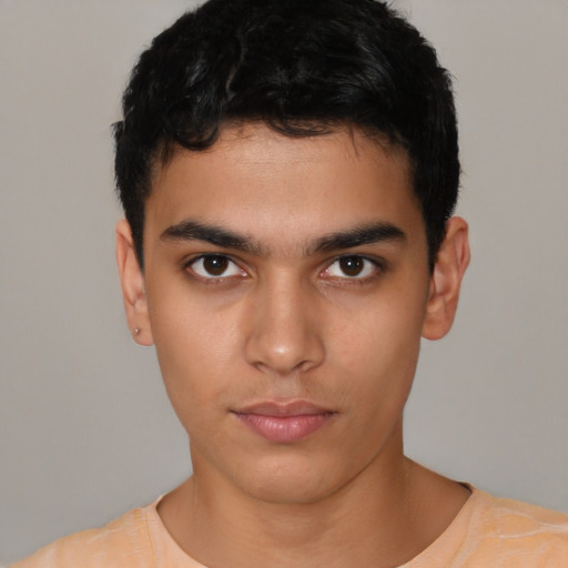 Neutral latino young-adult male with short  black hair and brown eyes