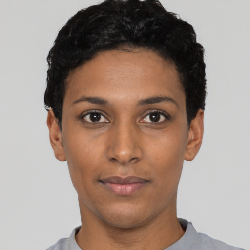 Neutral latino young-adult female with short  black hair and brown eyes