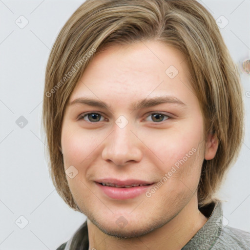 Joyful white young-adult female with medium  brown hair and green eyes