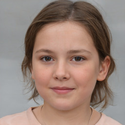 Joyful white child female with medium  brown hair and brown eyes