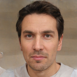 Neutral white adult male with short  brown hair and brown eyes