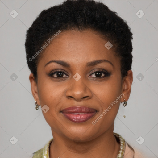 Joyful black young-adult female with short  brown hair and brown eyes