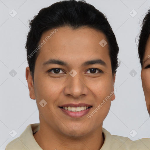 Joyful latino young-adult male with short  brown hair and brown eyes