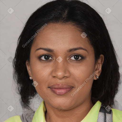 Joyful black adult female with medium  brown hair and brown eyes