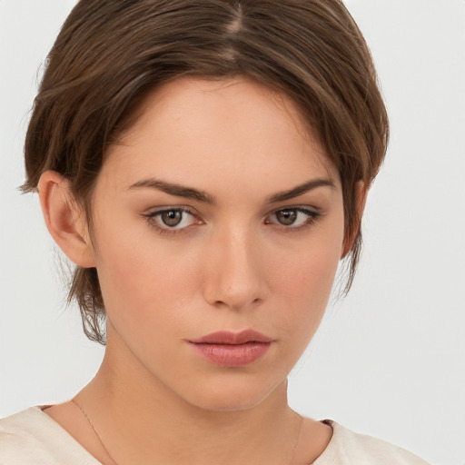 Neutral white young-adult female with medium  brown hair and brown eyes