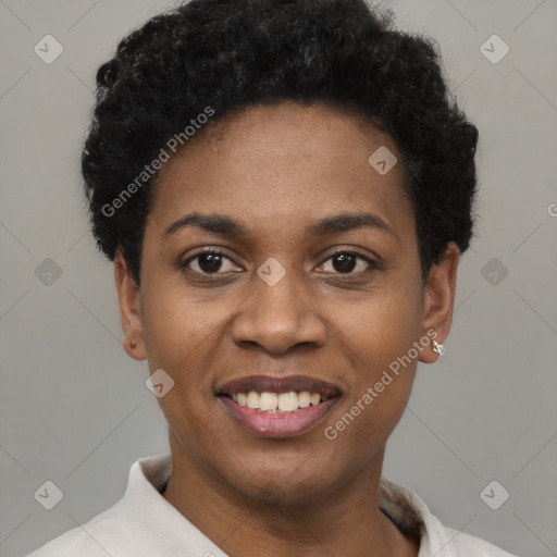 Joyful black young-adult female with short  black hair and brown eyes