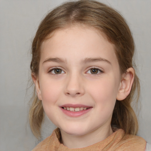 Joyful white child female with medium  brown hair and blue eyes