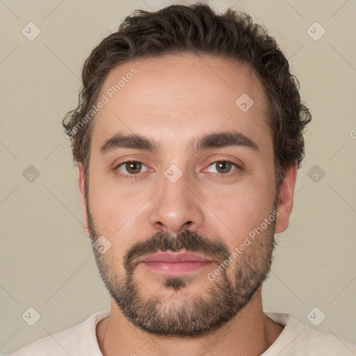 Neutral white young-adult male with short  brown hair and brown eyes