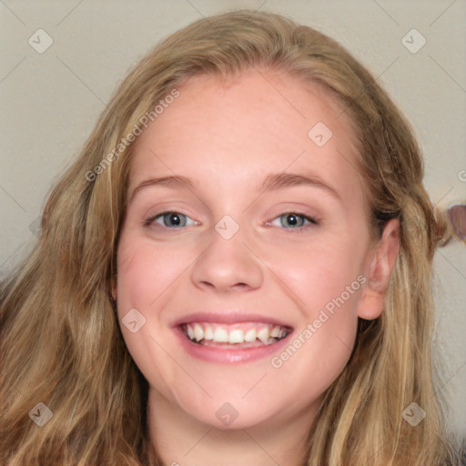 Joyful white young-adult female with long  brown hair and blue eyes