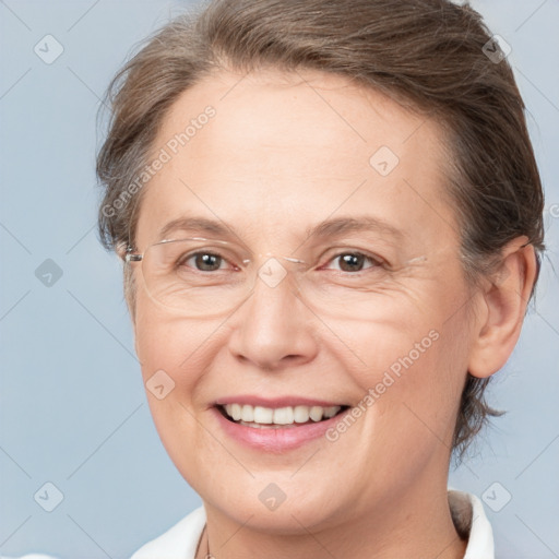 Joyful white adult female with short  brown hair and brown eyes