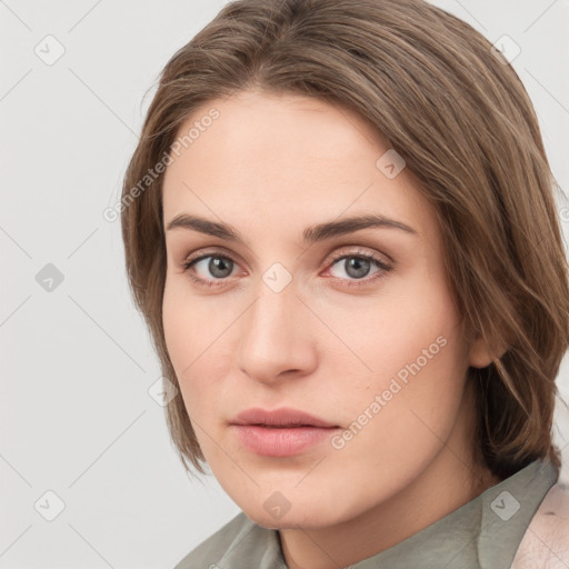 Neutral white young-adult female with medium  brown hair and grey eyes