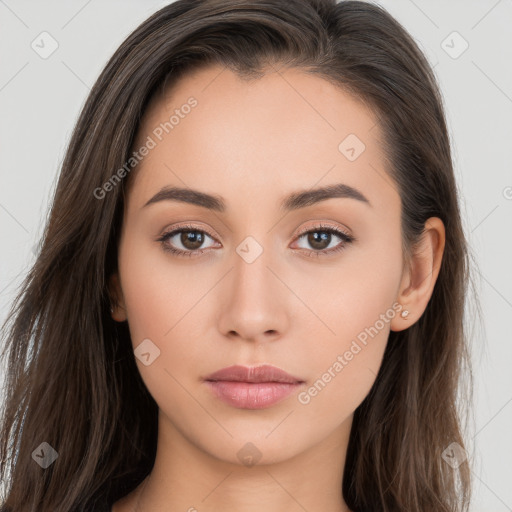 Neutral white young-adult female with long  brown hair and brown eyes