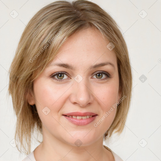 Joyful white young-adult female with medium  brown hair and green eyes