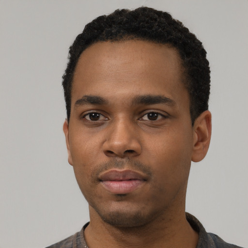 Neutral black young-adult male with short  black hair and brown eyes