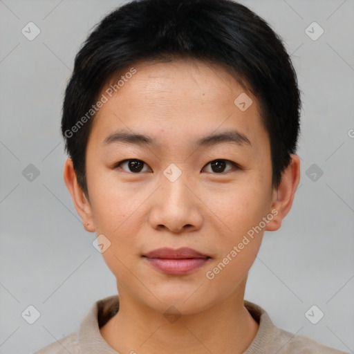 Joyful asian young-adult female with short  brown hair and brown eyes