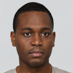 Neutral black young-adult male with short  brown hair and brown eyes