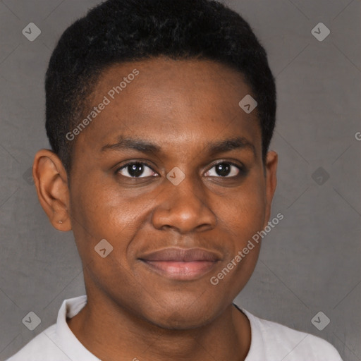 Joyful black young-adult male with short  brown hair and brown eyes