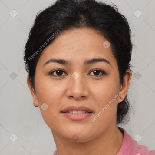 Joyful latino young-adult female with medium  brown hair and brown eyes