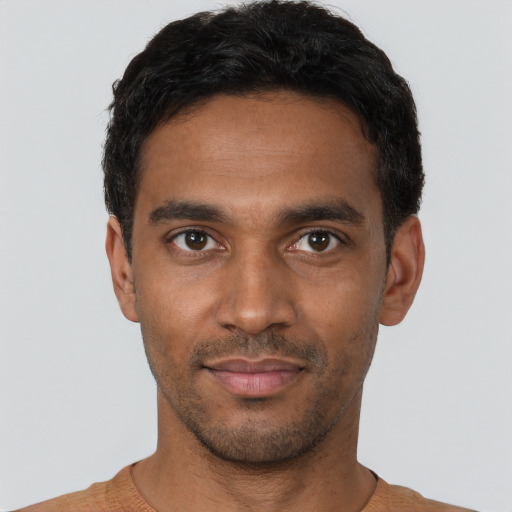 Neutral black young-adult male with short  black hair and brown eyes