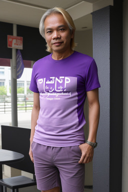 Malaysian middle-aged male with  blonde hair