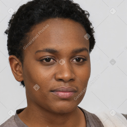 Neutral black young-adult female with short  brown hair and brown eyes