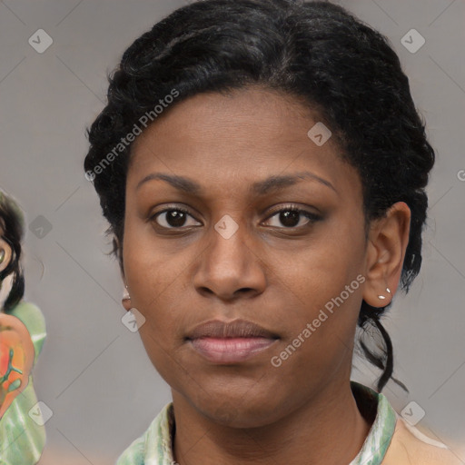 Neutral black young-adult female with medium  brown hair and brown eyes