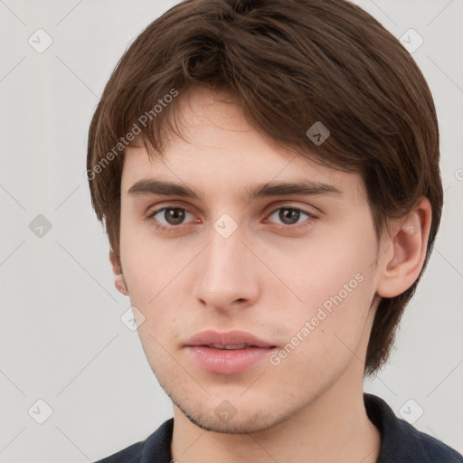 Neutral white young-adult male with short  brown hair and grey eyes