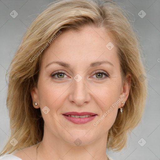 Joyful white adult female with medium  brown hair and blue eyes