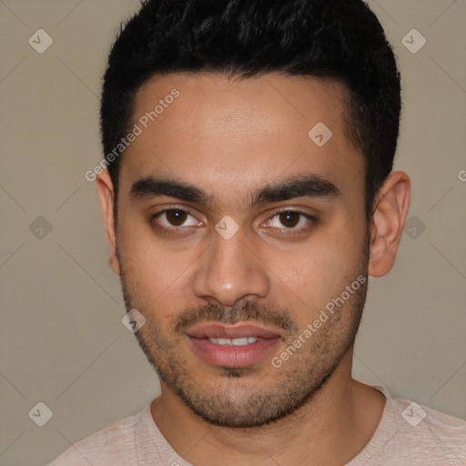 Joyful white young-adult male with short  black hair and brown eyes