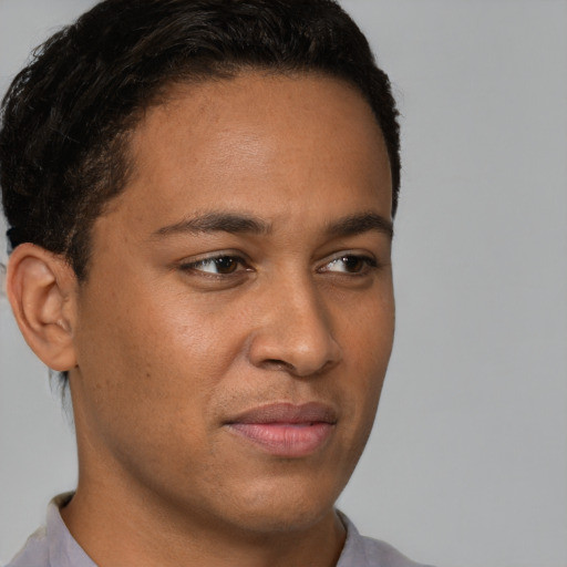 Neutral latino young-adult male with short  brown hair and brown eyes