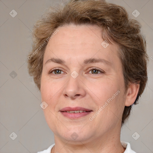 Joyful white adult female with short  brown hair and brown eyes