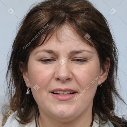 Joyful white adult female with medium  brown hair and brown eyes