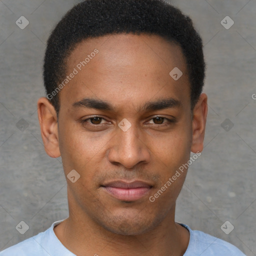 Joyful latino young-adult male with short  brown hair and brown eyes