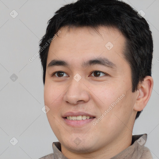 Joyful white young-adult male with short  black hair and brown eyes