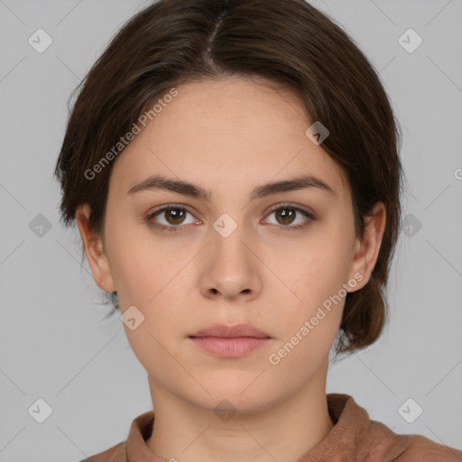 Neutral white young-adult female with medium  brown hair and brown eyes