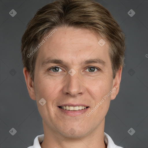 Joyful white adult male with short  brown hair and grey eyes