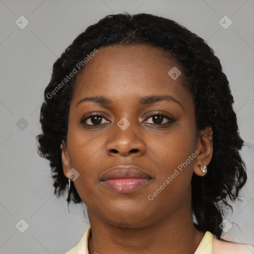 Neutral black young-adult female with medium  black hair and brown eyes