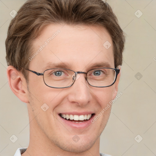 Joyful white adult male with short  brown hair and grey eyes