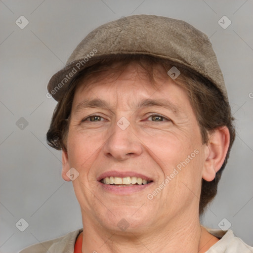 Joyful white adult male with short  brown hair and grey eyes