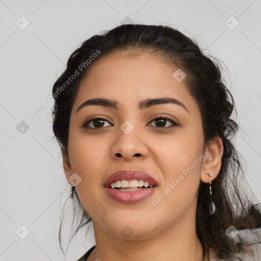 Joyful latino young-adult female with long  black hair and brown eyes