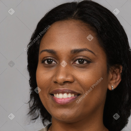 Joyful black young-adult female with medium  black hair and brown eyes