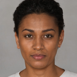 Neutral black young-adult female with short  black hair and brown eyes