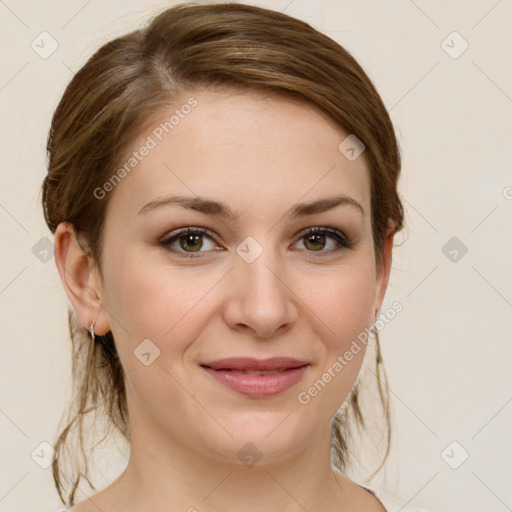 Joyful white young-adult female with medium  brown hair and green eyes