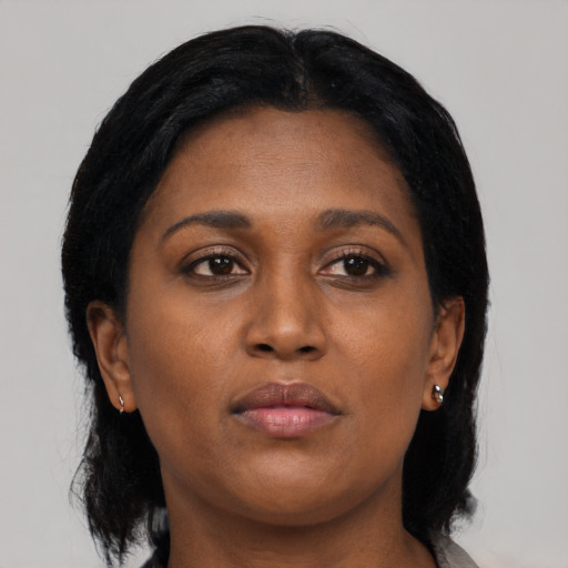 Neutral black adult female with medium  black hair and brown eyes