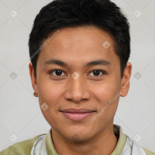 Joyful latino young-adult male with short  brown hair and brown eyes