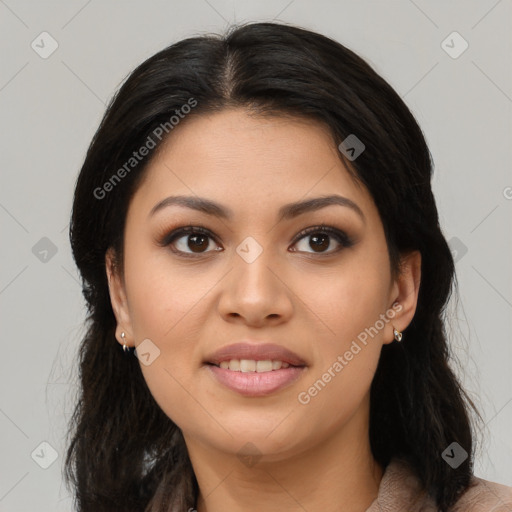 Joyful latino young-adult female with long  brown hair and brown eyes