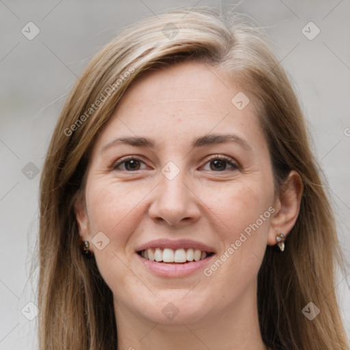 Joyful white young-adult female with long  brown hair and grey eyes