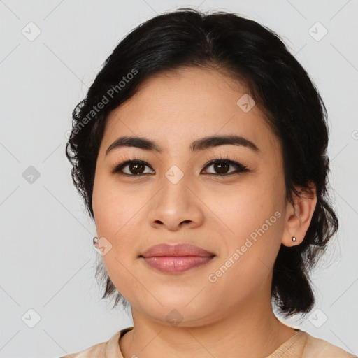 Joyful asian young-adult female with medium  black hair and brown eyes