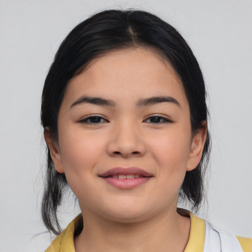 Joyful asian young-adult female with medium  black hair and brown eyes